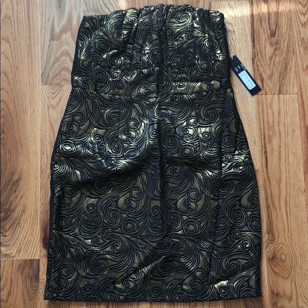 Black and gold bustier dress